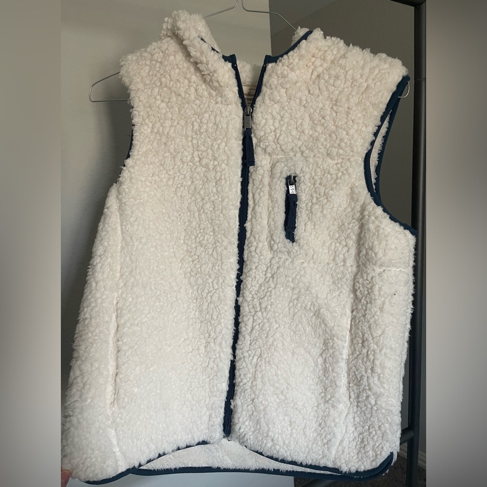 Puffy white and navy blue vest